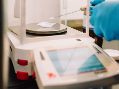 A technician compounding medication in Kamloops BC.