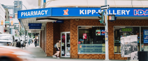 Exterior storefront of Kipp-Mallery Pharmacy on Victoria Street in downtown Kamloops, a long-standing local pharmacy serving the community with prescription, home health care, and compounding services.
