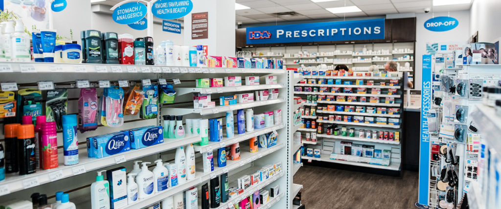 Interior of Kipp-Mallery Pharmacy in Kamloops with over-the-counter health products, prescriptions, vitamins, pain relief, and personal care items.